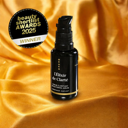 L’Élixir de Clarté – Blue Light Radiance Serum with AHA, Vitamin C + Brightening Peptides