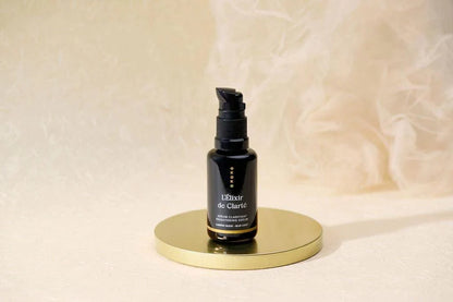 L’Élixir de Clarté – Blue Light Radiance Serum with AHA, Vitamin C + Brightening Peptides